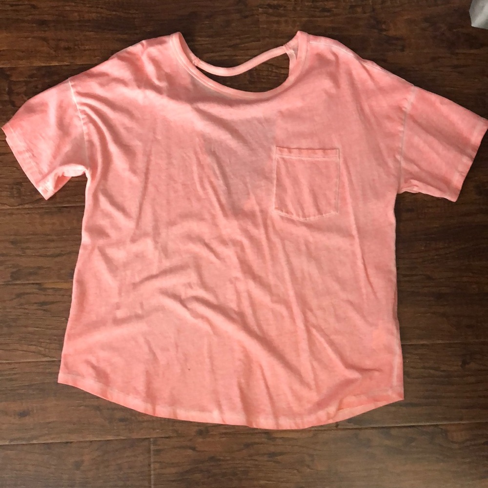 Bright peach/orange top with back cutout